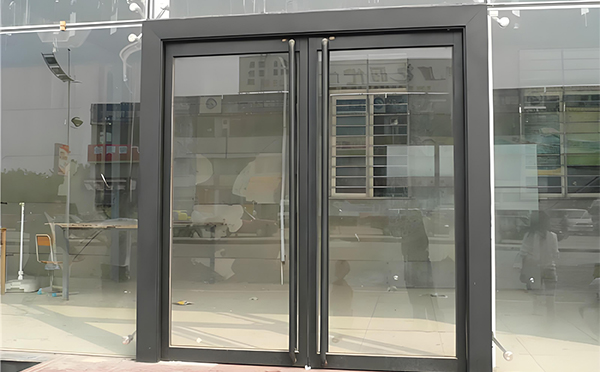 木垒玻璃地弹门