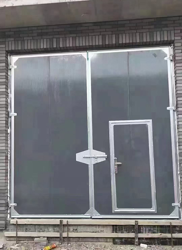 木垒工业平开门在大型设备制造车间的应用实例